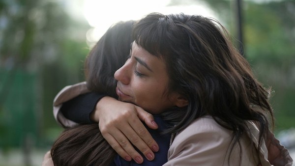 Two women embracing, reflecting emotional support during medical detox and stabilization