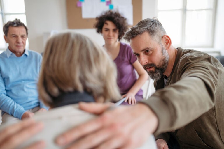 A family supports their loved one through addiction recovery struggles.